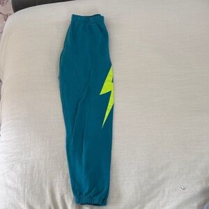 Aviator Nation Teal Joggers with Bright Yellow Bolt